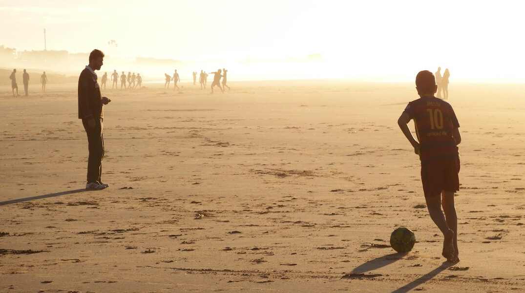 soccer player on beach