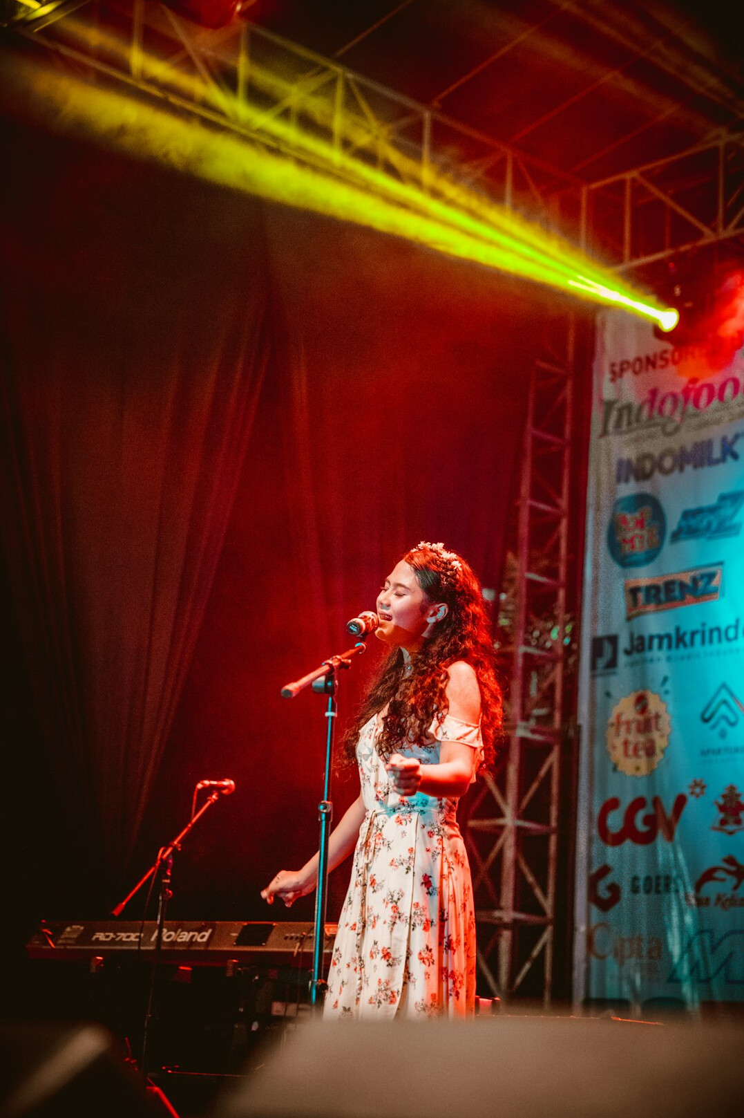 Uruguayan pop singer performing on stage with a microphone