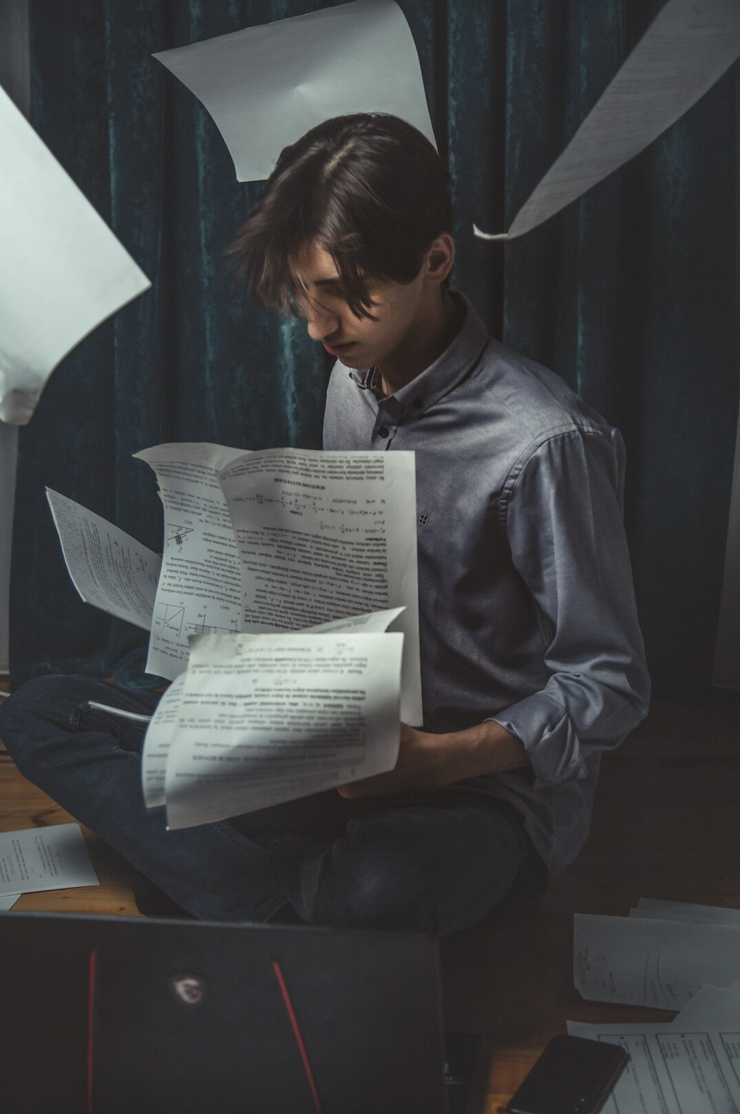 writer at desk with papers